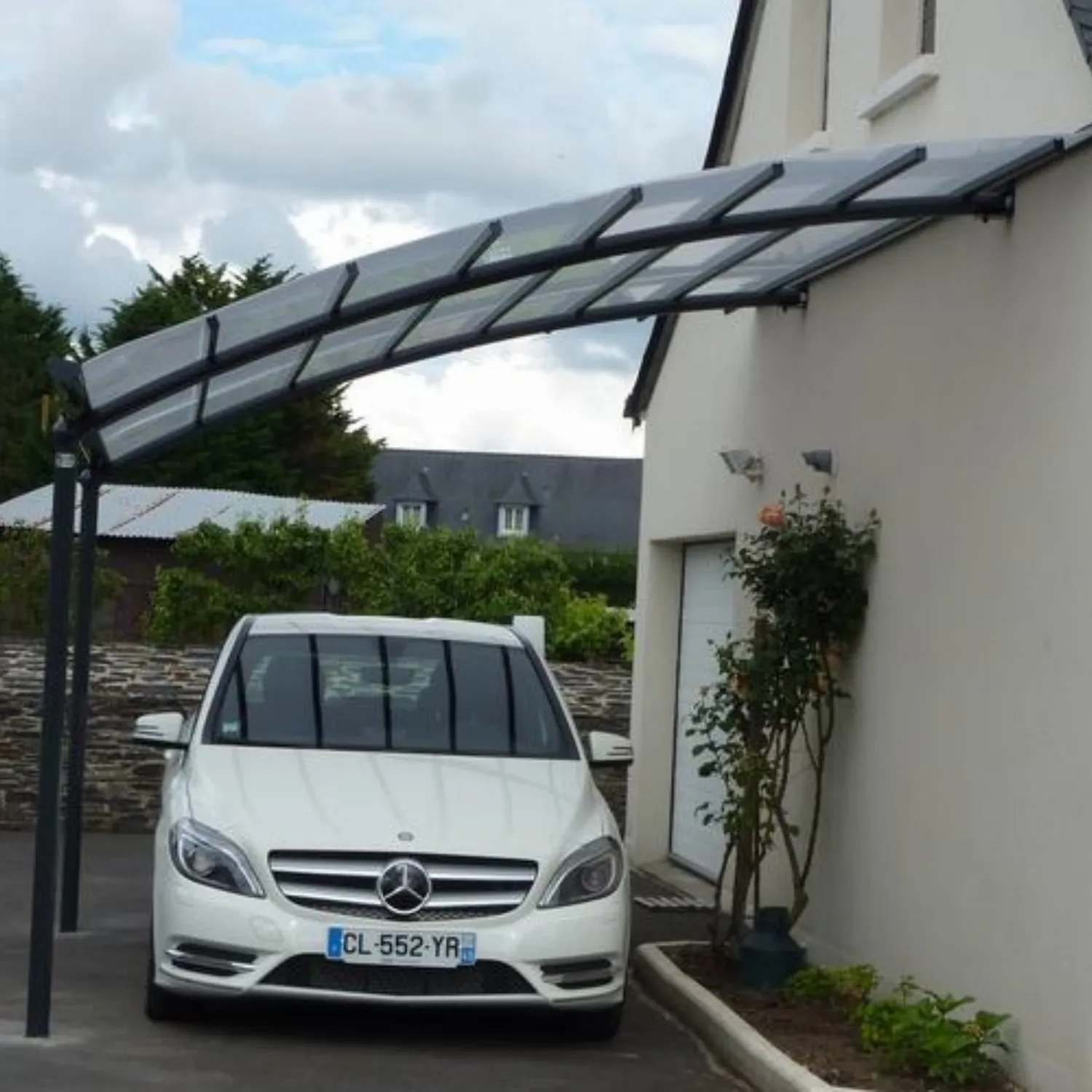 Abri terrasse toit en verre